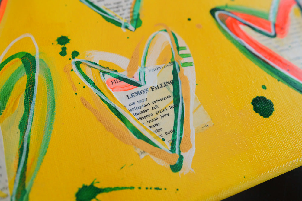 Close up of LEMON TREE. Original mixed media on canvas with vintage cookbook and hearts. 
