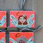 MERRY MAKERS! Original Holiday Art (Bright coral with black & white ribbon)